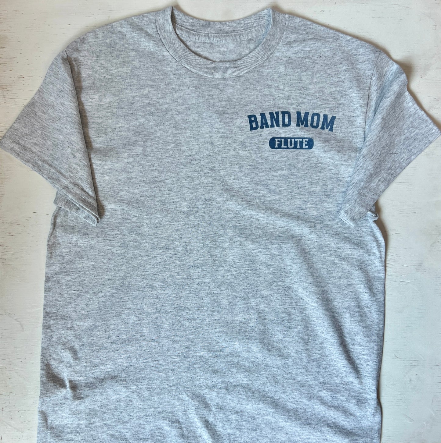 PHOTOS OF EXAMPLES OF CUSTOM SHIRTS FOR WEST