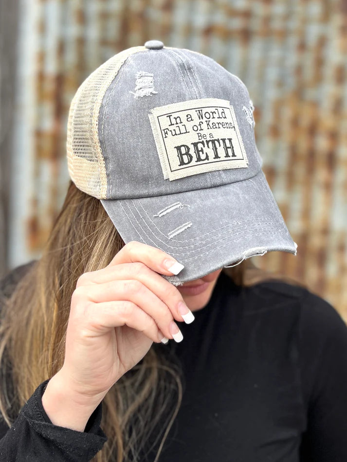 In a World Full of Karen's Be a Beth High Back Pony Hat