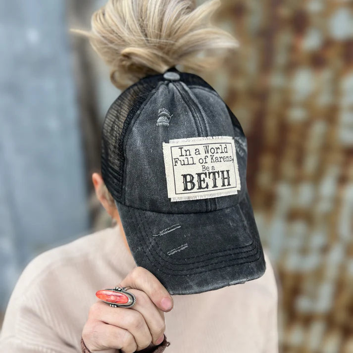 In a World Full of Karen's Be a Beth High Back Pony Hat